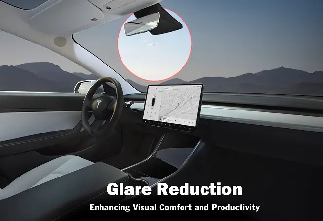Interior of a Tesla with a focus on the windshield and rearview mirror, highlighting glare reduction benefits through window tinting with text promoting visual comfort and productivity.